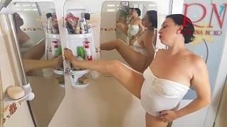 Nice lady in gosepod the shower room rubs cosmetic massage lotion oil on her beautiful legs. cam 1-2 - xpornplease.com on unlisto.com
